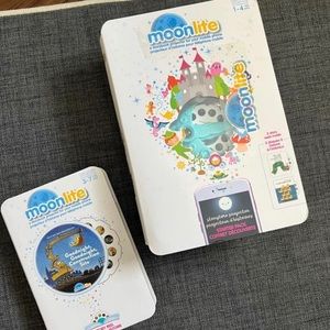 Moonlite projector and books